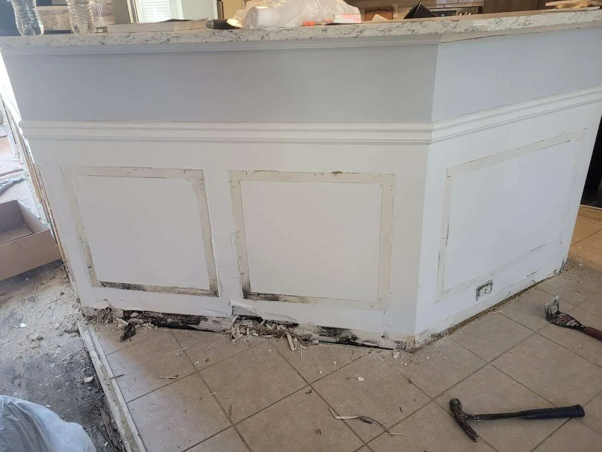 Water damage and mold on kitchen during Storm Damage Restoration in Dubuque